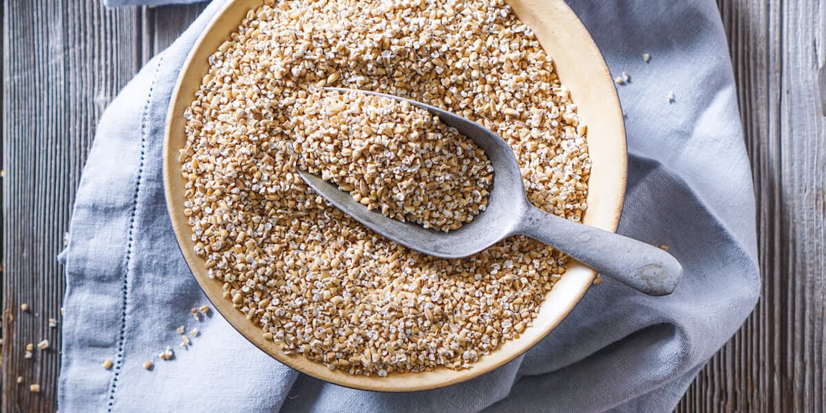 Raw Organic Steel Cut Oats in a Bowl.