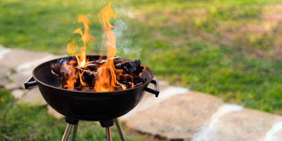 Burning wood in grill